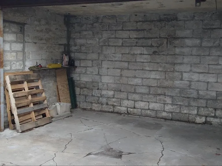 Garage can fit two more vehicles but needs to be repaired, and we are in the process of having that done.