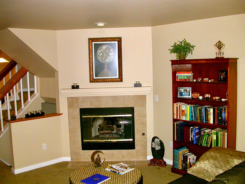 Living room with gas fireplace.