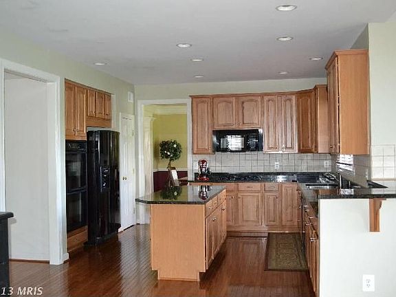 4th image of 10029 Three Sisters Ct