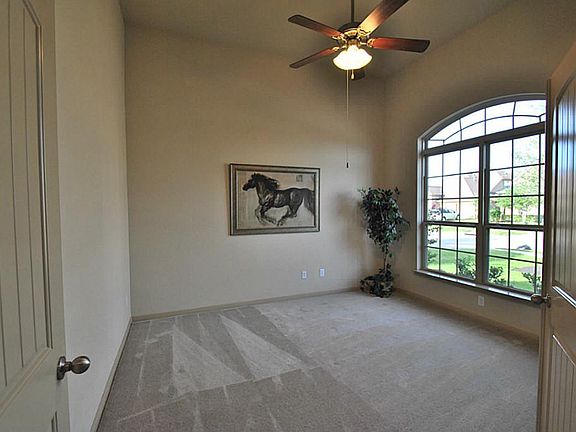 The French Doors Open to the High Ceiling with Upgrade Ceiling Fan and Upgrade Pull Out Windows! Gre