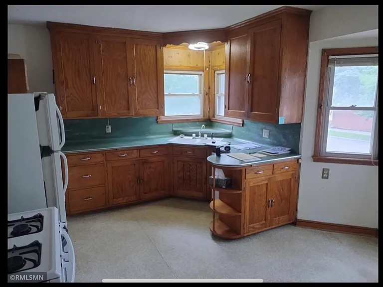 appliances have since been updated. Countertop microwave included. Eat in kitchen space not clearly shown in picture.