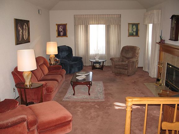 Living Room with Wood Burning Fireplace