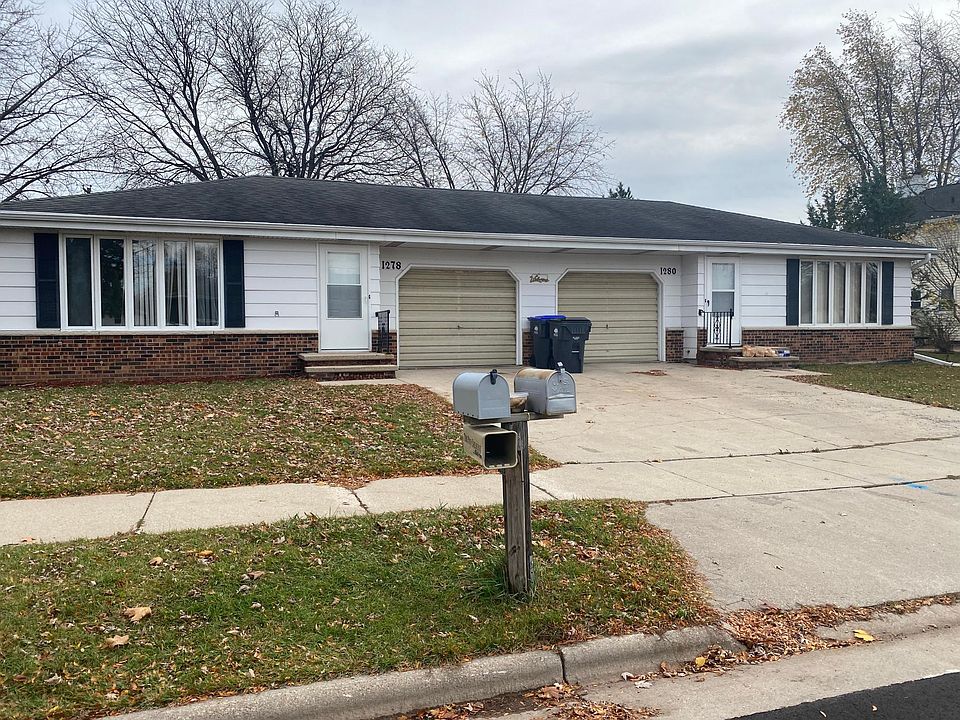 attached one car garage duplex