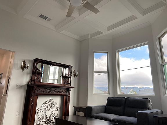 Mantle and east-facing bay windows