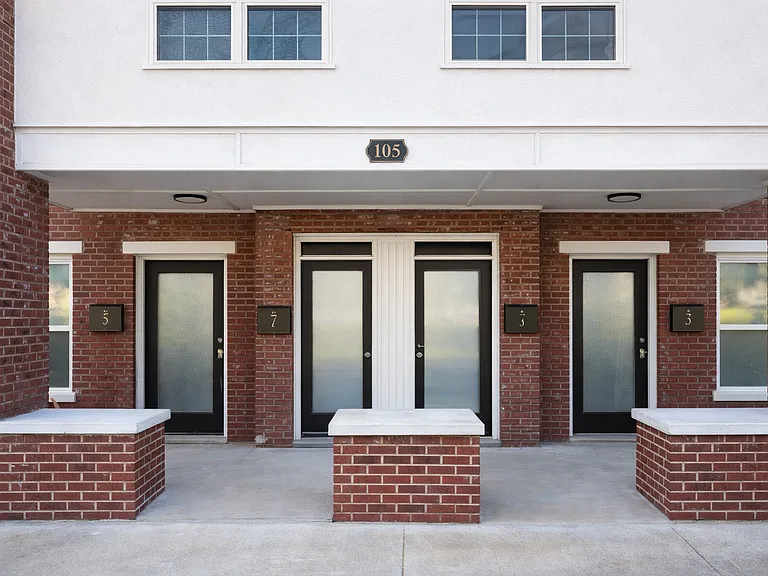 Front of apartment building with 4 units.