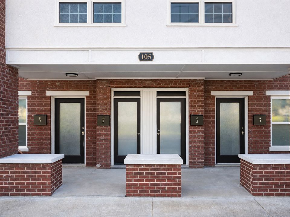 Front of apartment building with 4 units.