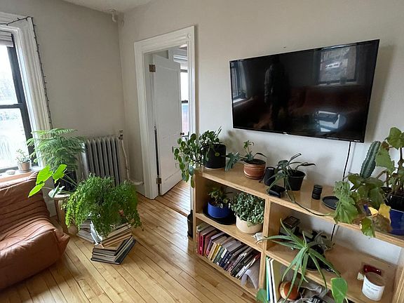 living room, entrance door to the office
