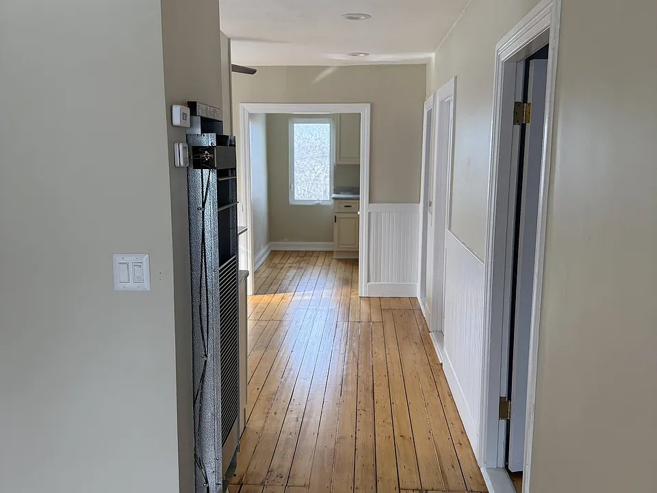 Front door view through kitchen view.
Note: heater cover removed for painting purposes