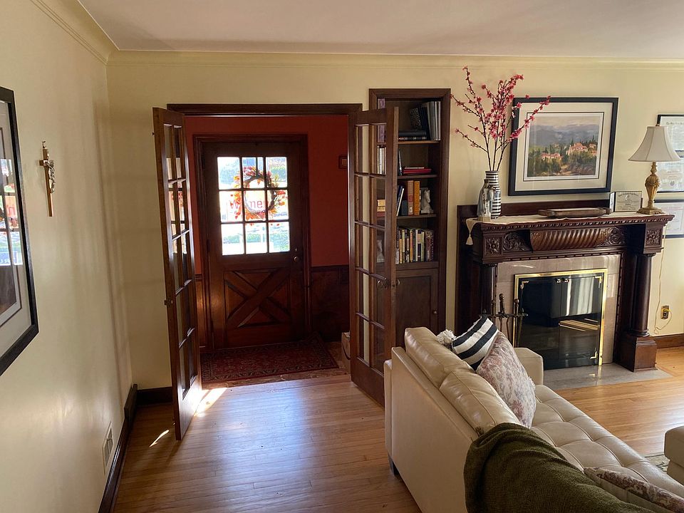 Foyer and front door off of formal living room.
