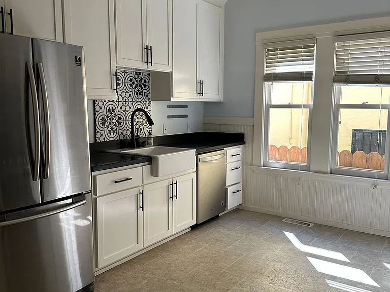 separate modern kitchen with space for a small table