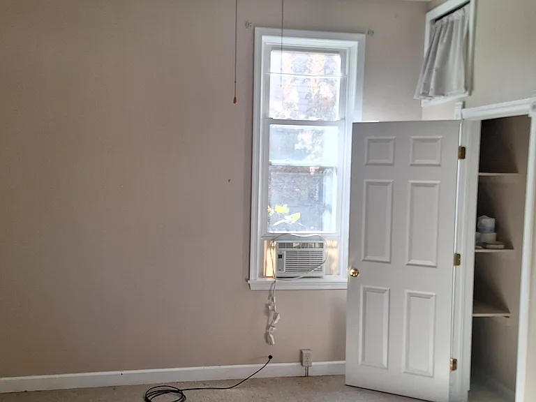 Bedroom with High Ceilings and bathroom