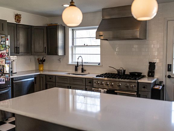 You get the stove as is, but fridge and dishwasher will be replaced with stainless steel appliances.