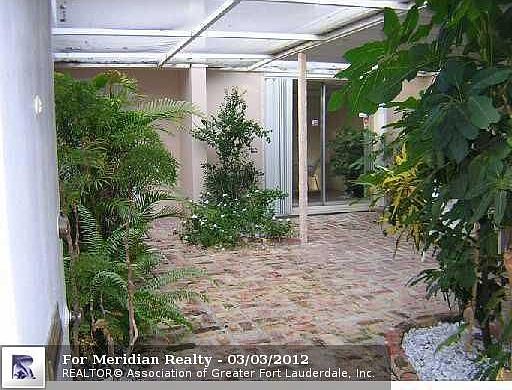 1st image of 3089 N Palm Aire Dr