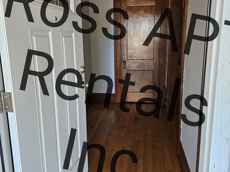 Front door and hall closet with mirror