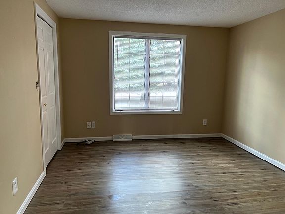 Bedroom with walk-in closet