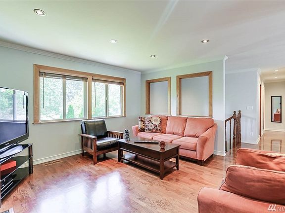 Enjoy hardwood floors throughout and a cozy family room with ample natural light.