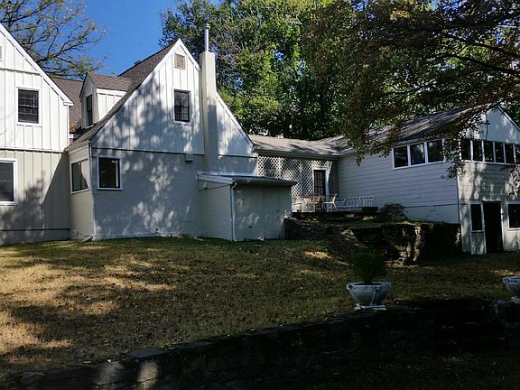 Rear of property, storage behind garage.