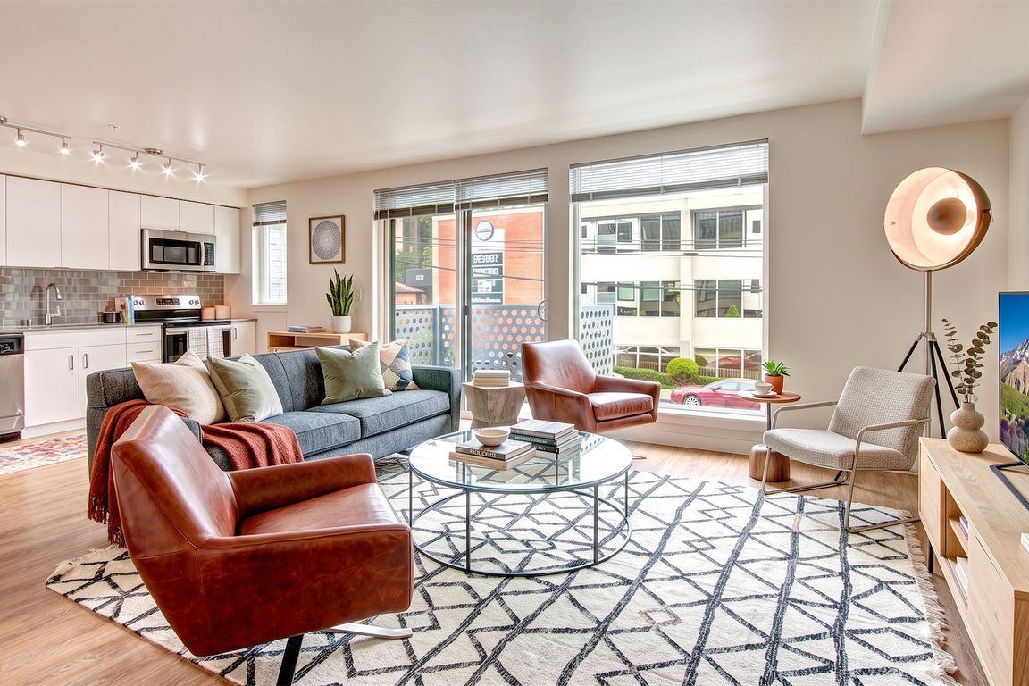 One of the larger layouts, with room for a full seating group and an open kitchen at the far end.