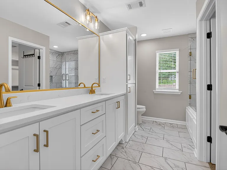 Master bath, dual sink vanity, large cabinets with plenty of storage