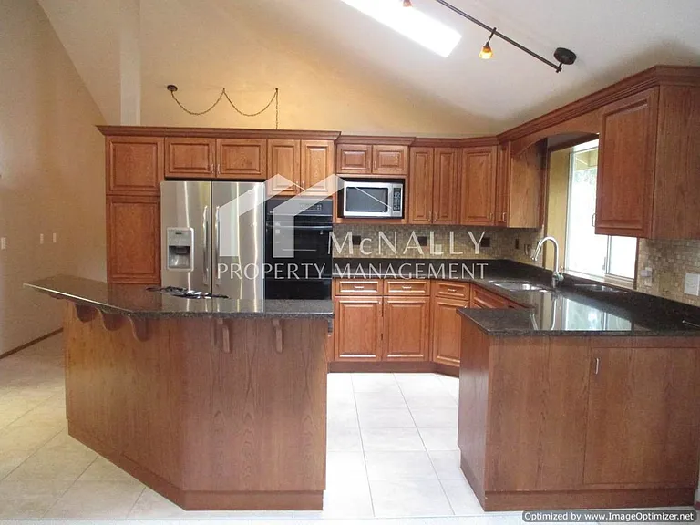 3910 60th Street Ct NW — Photo 2