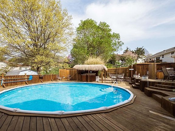 Fabulous above ground pool with custom decking.