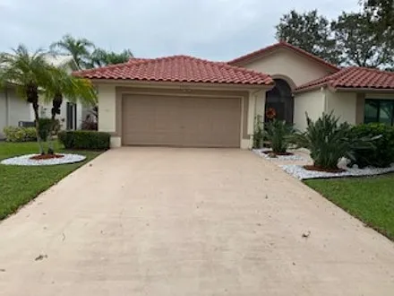 Two-car driveway, 1 car fits inside garage, the rest of the garage has a workbench and shelving units - that can be used for your storage