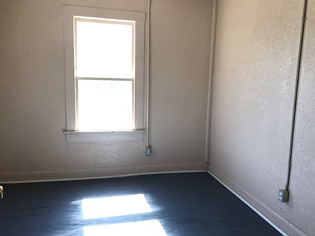 Bright bedroom off of the living room