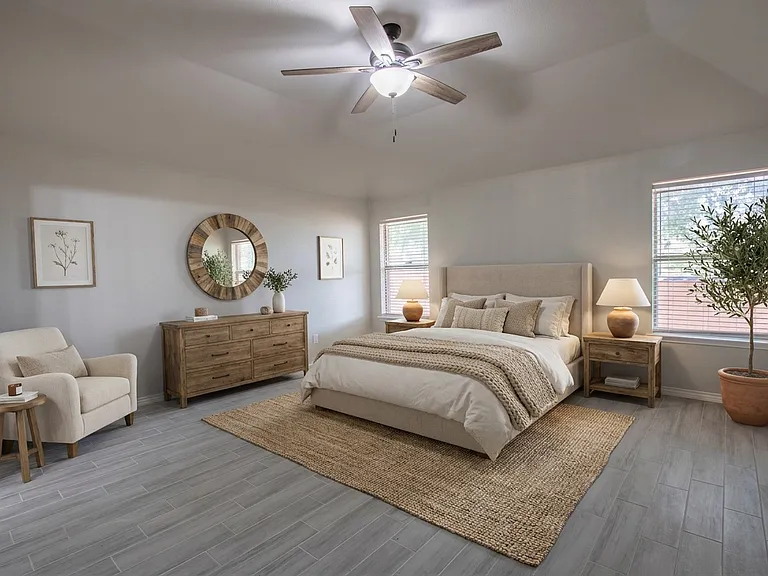 This photo of the master bedroom has been virtually staged