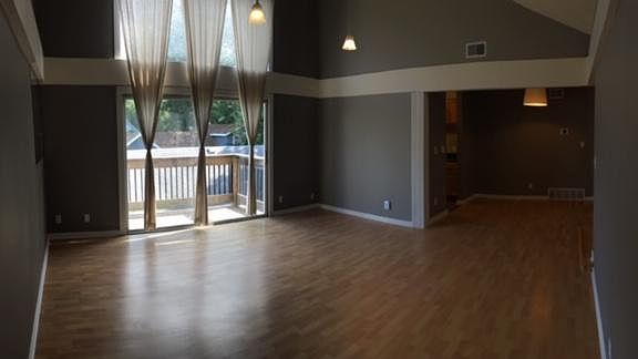 Living Room w/ Vaulted Ceilings