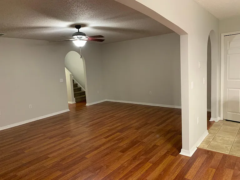 Great room with hardwood floors.
