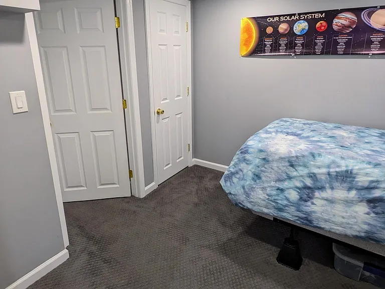 Separated third bedroom/office features private bathroom.