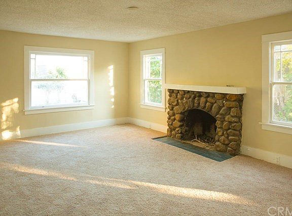 The Living Room with Fireplace.