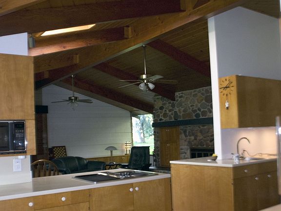 VIEW FROM KITCHEN THROUGH FAMILY ROOM INTO REAR GARDEN