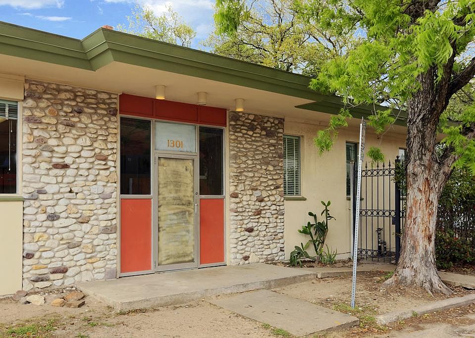 This ca. 1964 professional building is ready for a Second Life in the Downtown Warehouse District. I