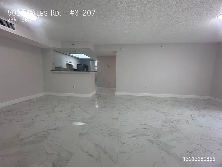 5011 Wiles Rd #3-207 — Photo 9