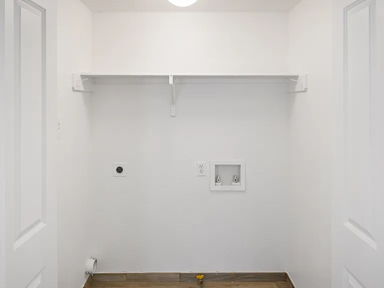 Washer and Gas Dryer hookups for full sized appliances.