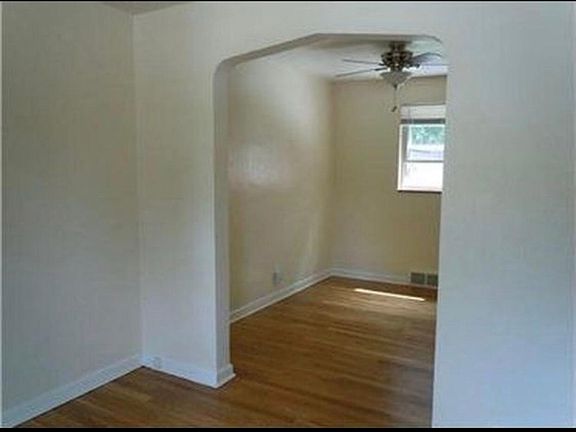 Archway from living room into dining room