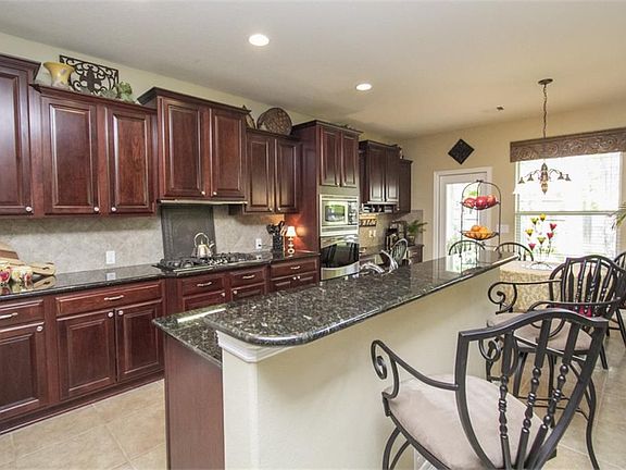 The kitchen island, bar makes this perfect for entertaining.