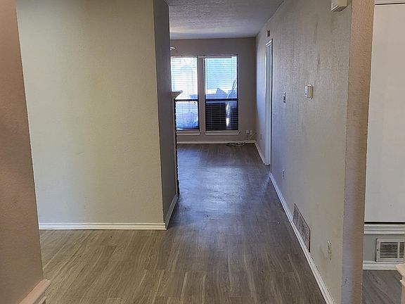 Entering from the front door.
Kitchen to the left, second bed and bathroom to the right.