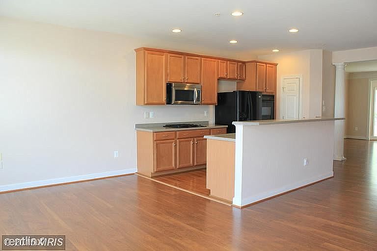 living area connecting to kitchen