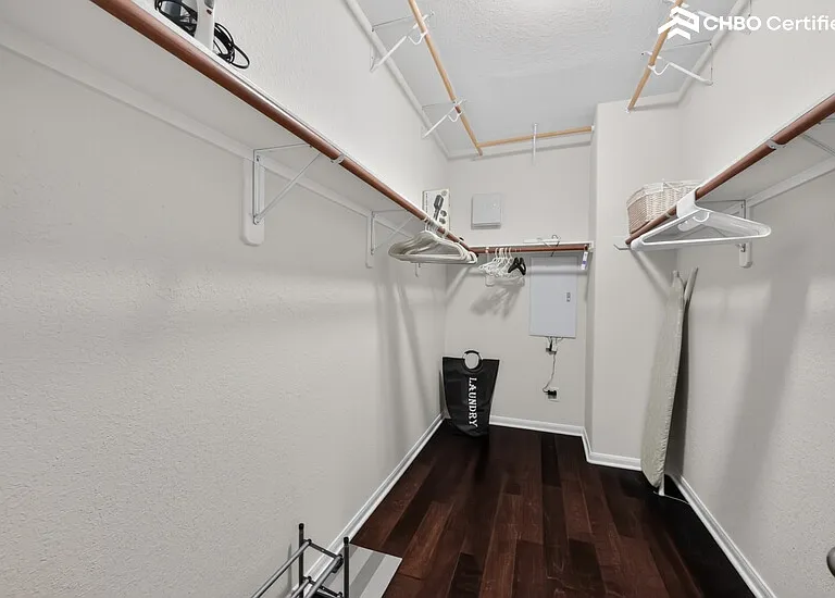 Walk-in closet in primary bedroom