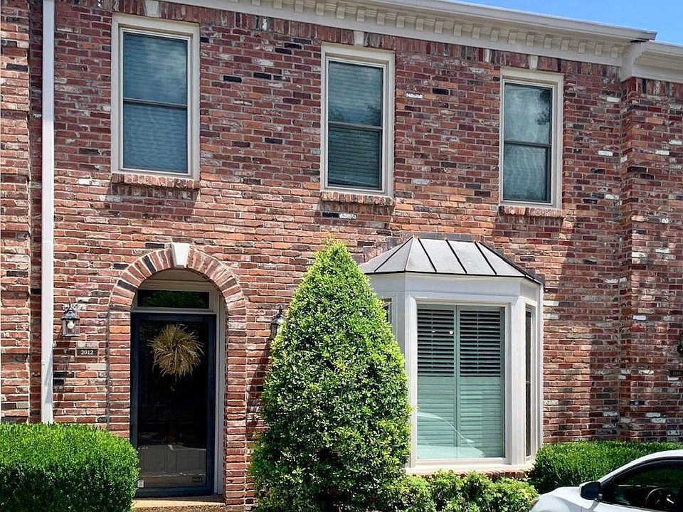 Exterior view with dedicated parking space right in front of the door!