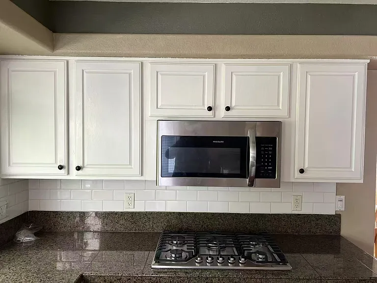 Gas cook top, cabinets, microwave oven