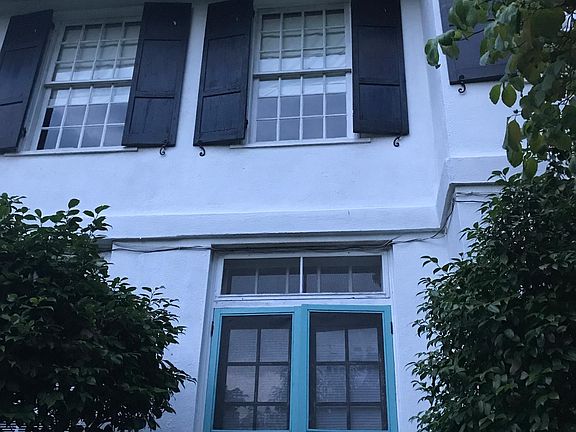 Apartment entrance- main residence above