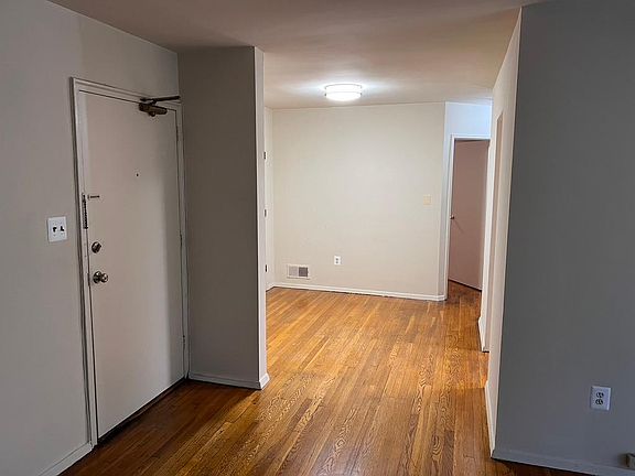 Entrance Door, Dining Room and hallway as seen from living room.