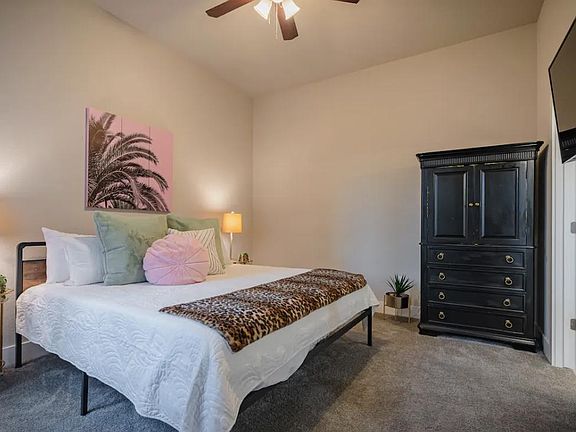 Master Bedroom downstairs (King bed) with en suite bath.