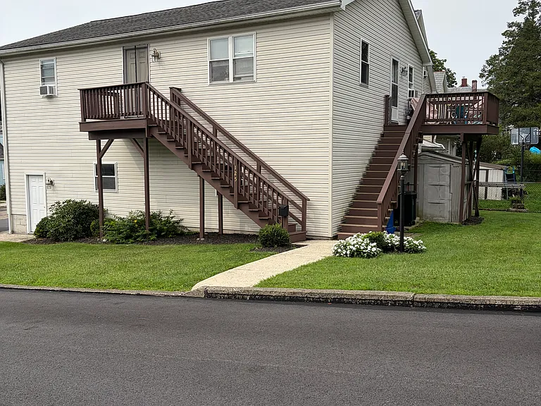 Exterior view
Street parking
Both entrances to unit