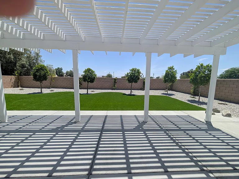 Fully covered patio provides perfect outdoor entertaining and living space from the sun.