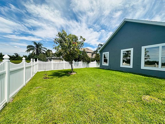 Private fenced yard.