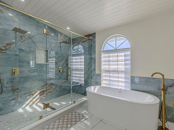 Main bath walk in shower soaking tub